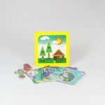 Kit Centro de Atividades Placa de Pinos da Materiais Para Brincar, mostrando uma placa de pinos de plástico com elásticos coloridos esticados formando um quadrado.