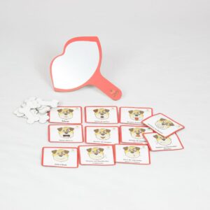 Jogo Imite o Cachorrinho da Materiais para Brincar, com figuras magnéticas de exercícios orofaciais, ossinhos de recompensa e um espelho em forma de boca.