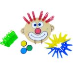 Kit Palhaço Cabelo Pregador da Materiais para Brincar, mostrando um rosto de palhaço em MDF com pregadores coloridos presos ao seu redor, combinando com a cor do nariz.